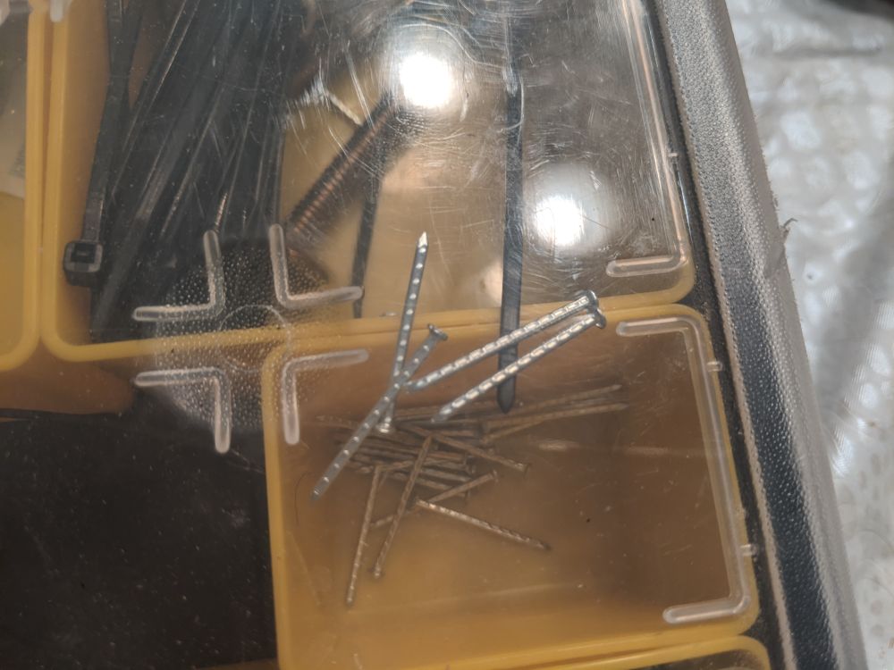 Harbor Freight Parts Organizer with parts moving between bins